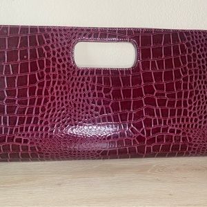 Faux crocodile pattern clutch with small compartment inside